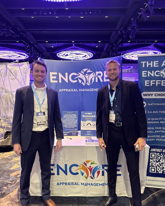 Brian and Cory at the Encore booth at a New York industry conference
